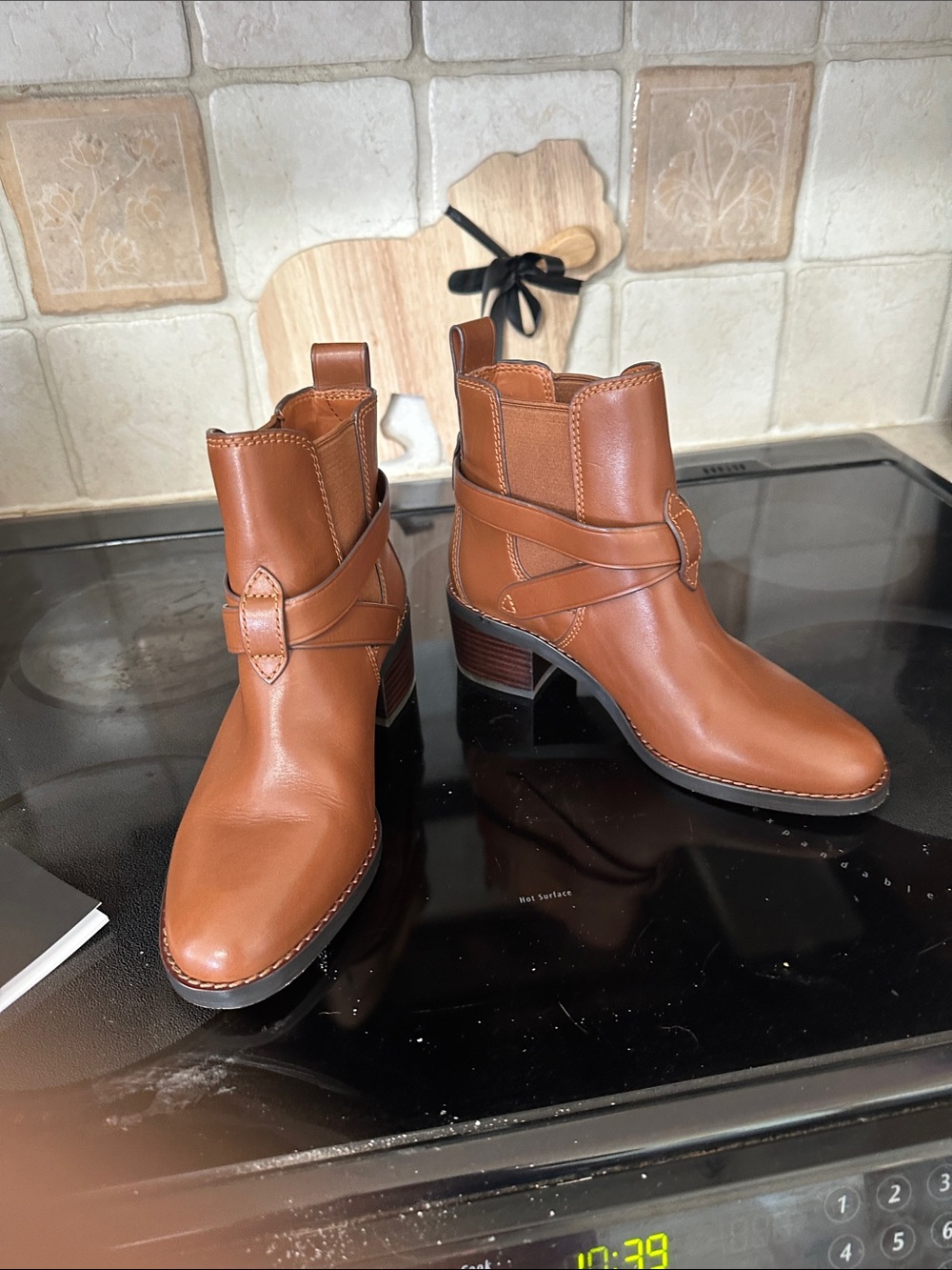 Coach women’s cognac booties with Box
